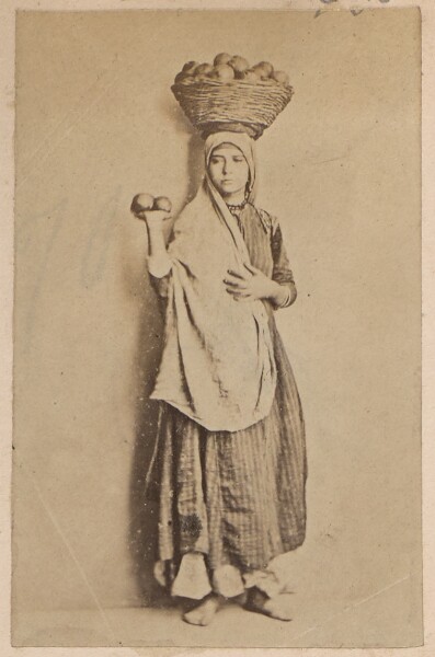 Unknown, [Woman with Basket on Head]