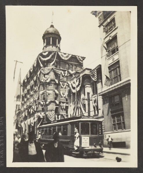 Unknown, [View of The Dome Building Adorned with Flags]