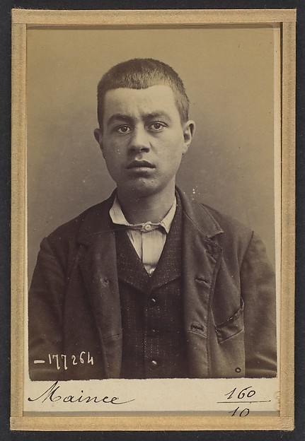 Alphonse Bertillon, Maince. Émile. 19 ans, né à Levallois-Perret (Seine). Réparateur d'objets d'arts. Anarchiste. 6/1/94.