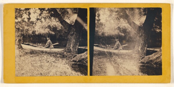 Unknown, [Man posed in rowboat]