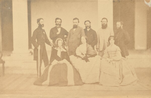 Unknown, [Group portrait of six men and three women, India]