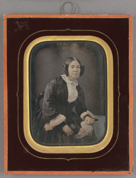 Unknown, [Portrait of a Seated Woman with Large Single Curls on Each Side of Head]