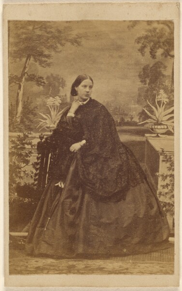 Unknown, [Unidentified woman seated, with hand to collar]