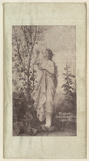 William S. Kimball & Company, Woman smelling blossom on tree (on green silk), from the Girl Art Subjects series (N193) issued by Wm. S. Kimball & Co.