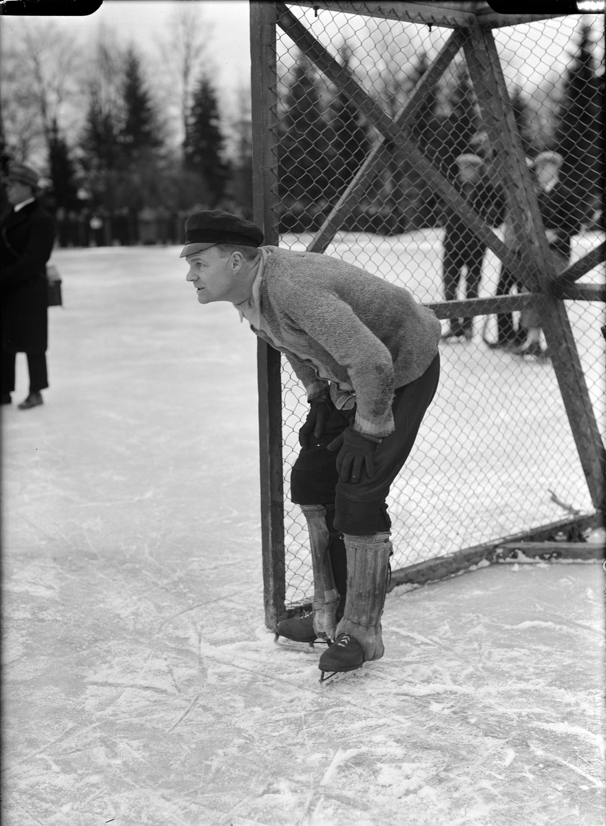 Paul Sandberg, The goalkeeper Sven “Sleven” Säfwenberg in a bandy match against Västerås S K at the Students' Sports Square, Kronåsen