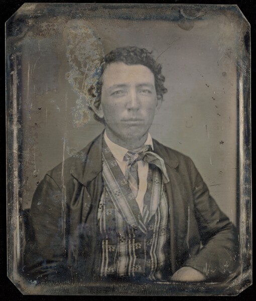 Unknown, [Portrait of a Seated Man with Curly Hair]