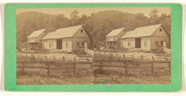 Unknown, [Exterior view of large house and connecting barn, mountain in background, fence in foreground]