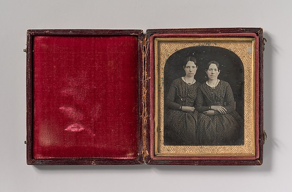 Unknown, [Two Seated Young Women Identically Dressed]
