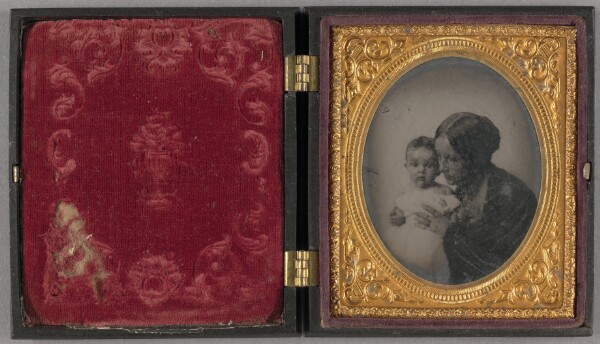 Unknown, [Portrait of a woman holding her baby]
