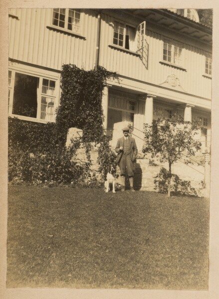 Unknown, [Portrait of man with dog]