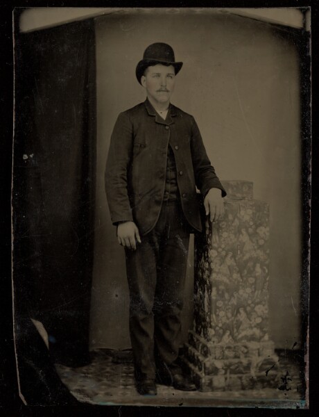 Unknown, [Unidentified man with moustache wearing a derby, standing]