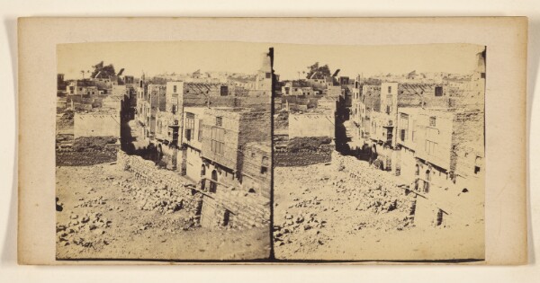 Francis Frith, [Open area with rocks, village in background]