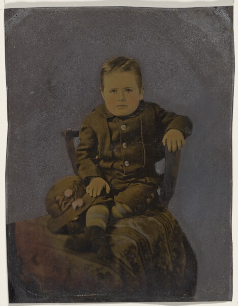 Unknown, [Portrait of small boy holding hat]