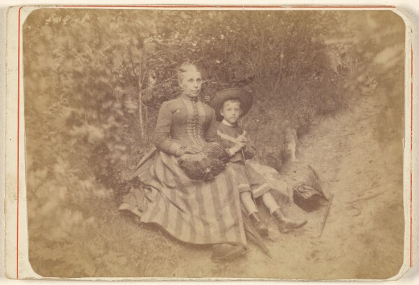 Unknown, [Woman seated on the ground with an boy]