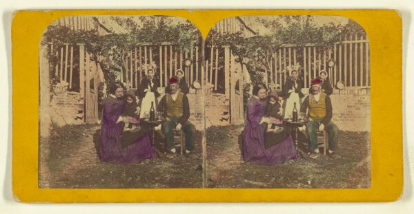 London Stereoscopic and Photographic Company, [Genre scene: family seated outside aorund a table with glasses and a bottle of wine]