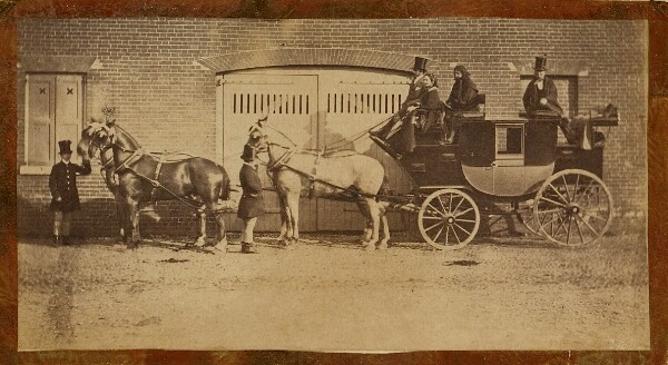 Unknown, [Group riding in six-horse coach]