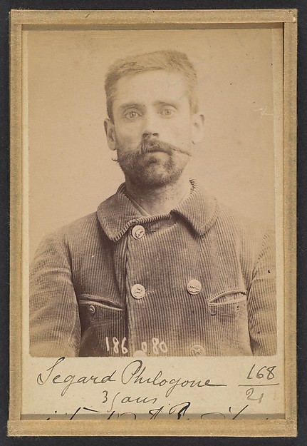 Alphonse Bertillon, Segard. Philogone. 44 ans (35 ans inscrit sur la photo), né à Salond (Somme). Journaliste. Anarchiste.