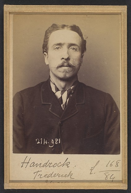 Alphonse Bertillon, Handrock. Frédéric(k). Vilhem. 34 ans, né à Lyeck (Allemagne). Doreur sur bois. Anarchiste. 2/3/94.
