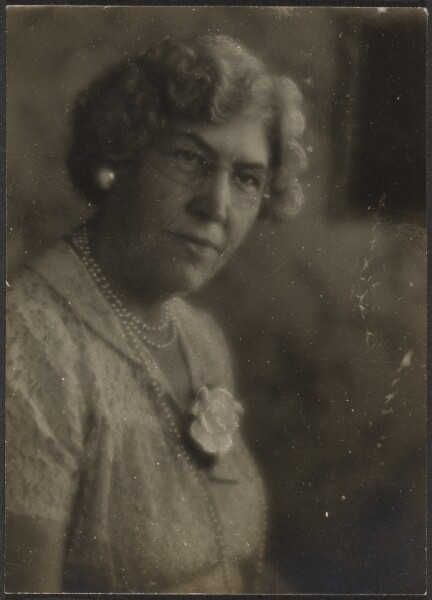 Louis Fleckenstein, [Woman with White Flower and Pearls]