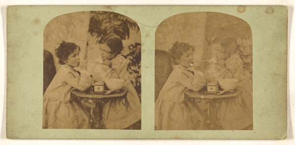 Unknown, [Two little girls at a small table]