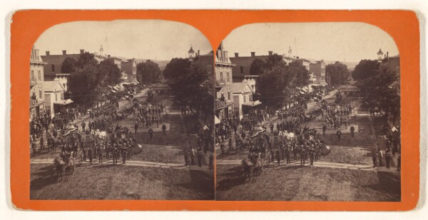 Unknown, [Parade down a main street]