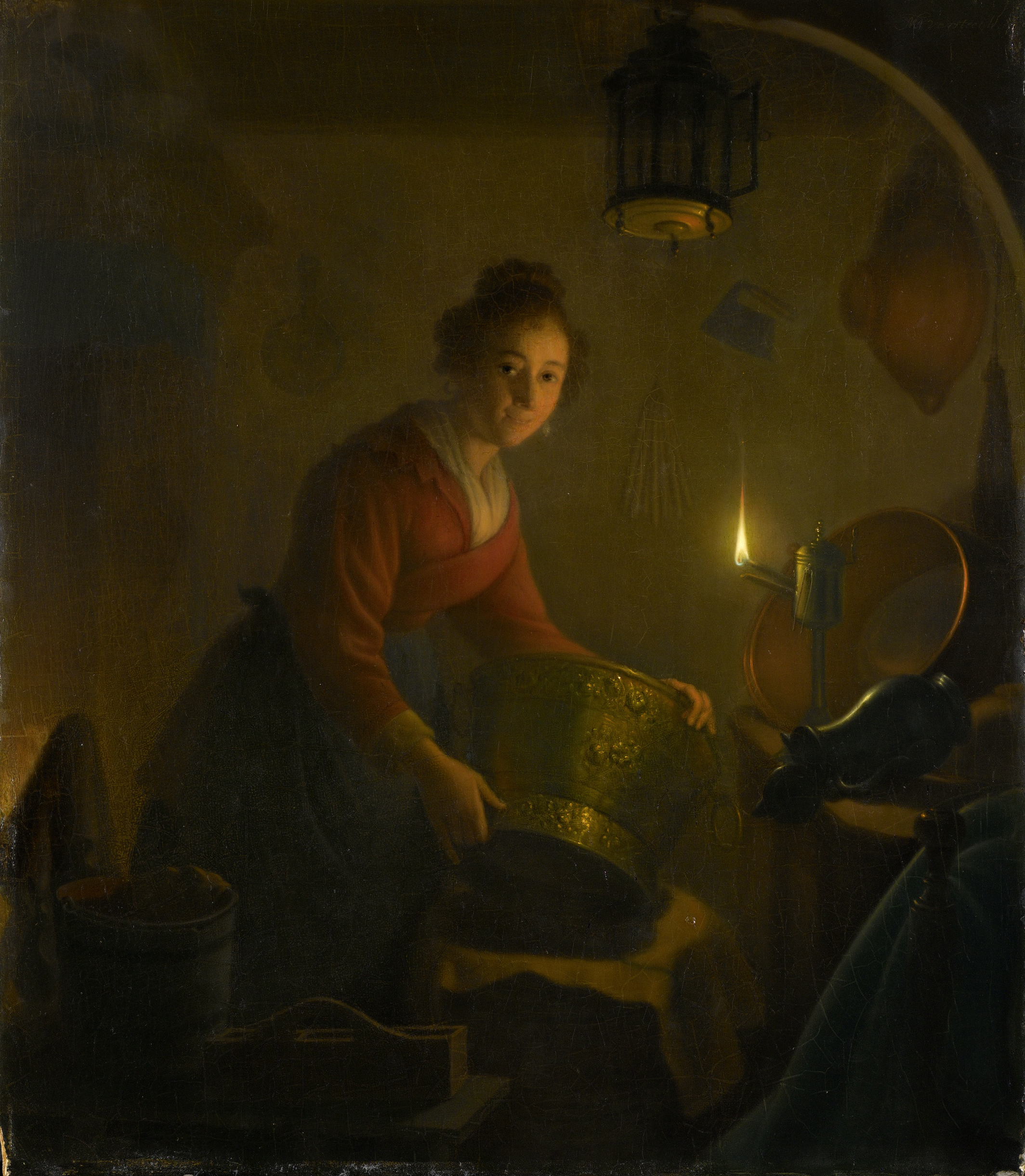 Michiel Versteegh, A Woman in a Kitchen by Candlelight