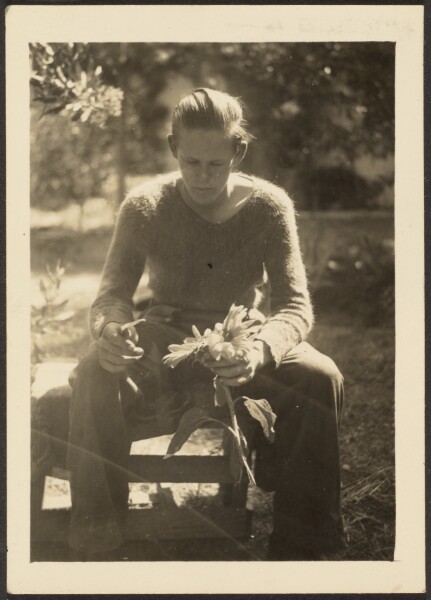 Louis Fleckenstein, [Woman Holding Sunflowers]