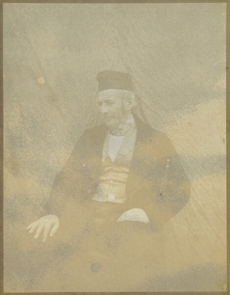 Hippolyte Bayard, [Portrait of a Seated Man in a Cap]