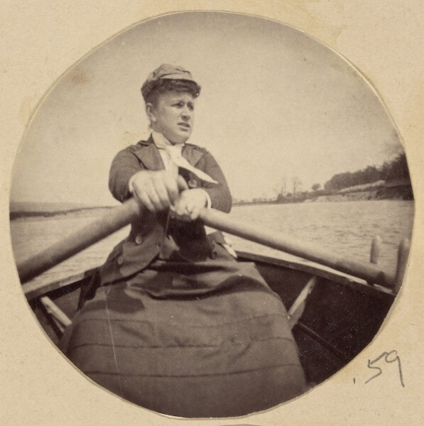 Unknown, [Woman in hat rowing a boat]