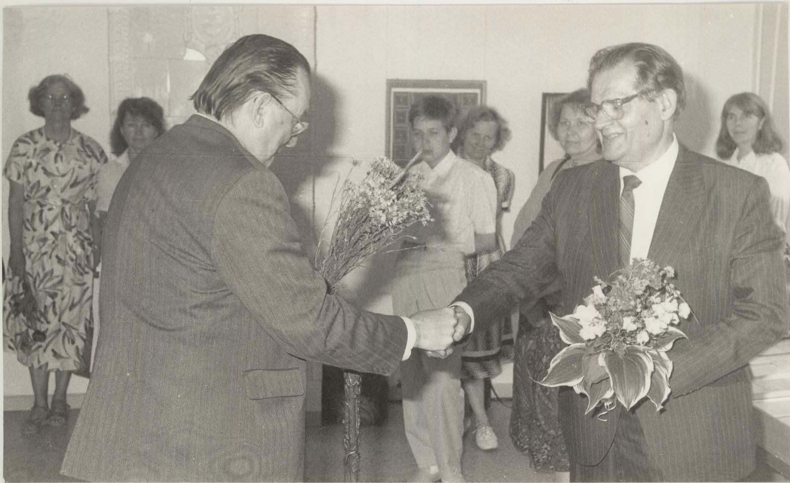 Krista (depicted) Border Hill, Opening of Kaljo Field Exhibition 30.06.1994.a. Artist congratulates Jaan Eilart (left)