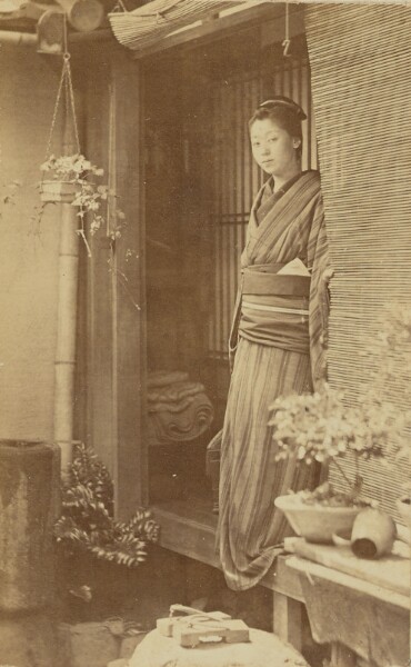 Unknown, [Japanese Woman Standing in a Doorway]