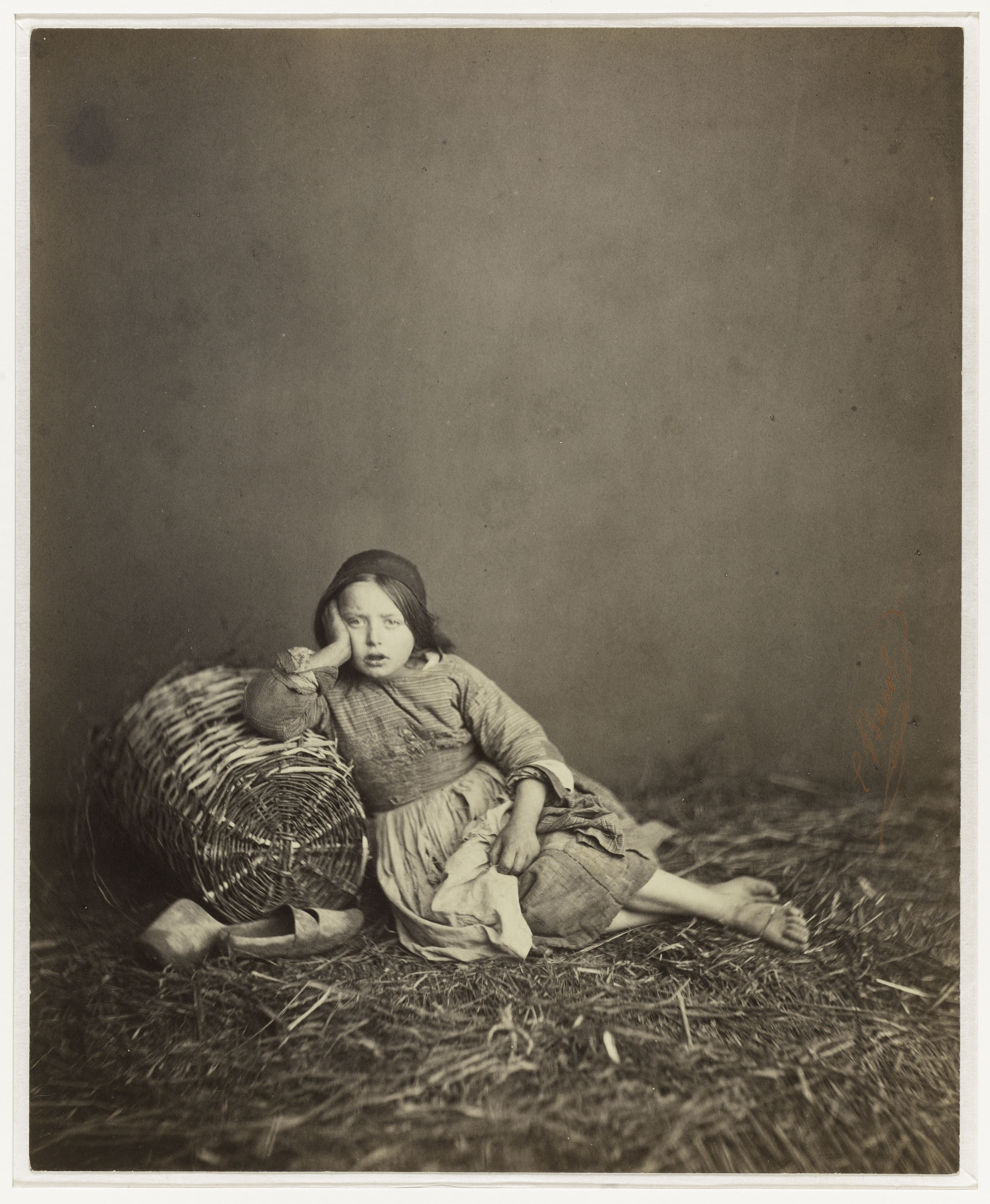 Edmond Bacot, Enfant assise dans la paille accoudée à un panier