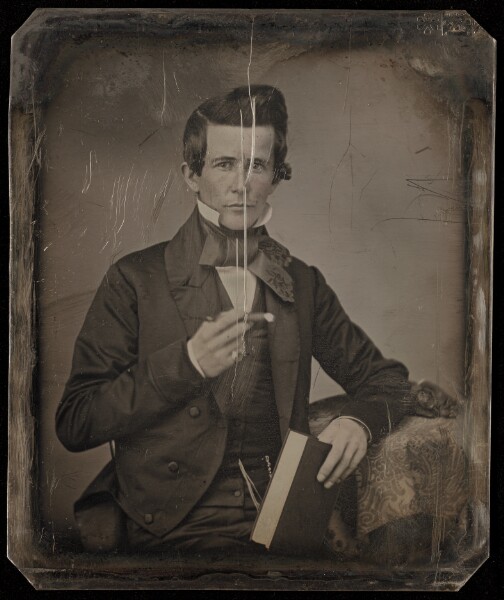 Unknown, [Portrait of a Seated Man with Cigar]