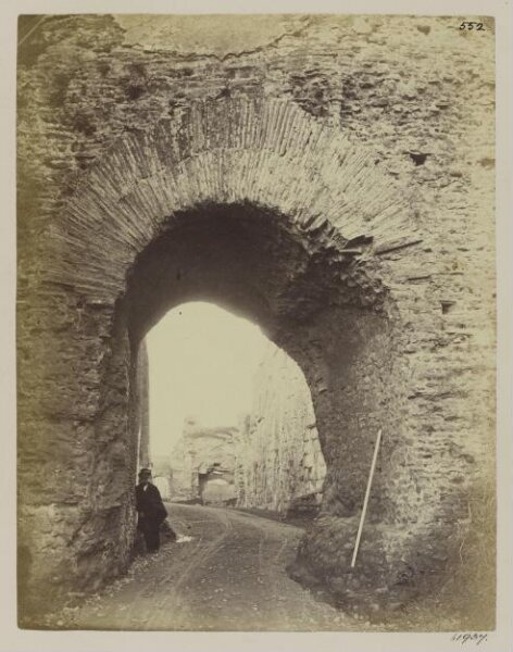 Parker, John Henry, Aqueducts - Arcade of the Claudian and Marcian Aqueducts, near the Porta Furba, at an angle crossing the road.