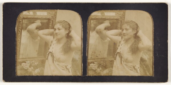 Unknown, [Woman before mirror with hands behind head, one breast exposed]