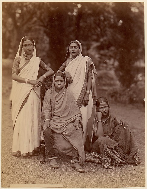 Unknown, [Four Hindu Women, One Seated in a Chair, Outdoors]