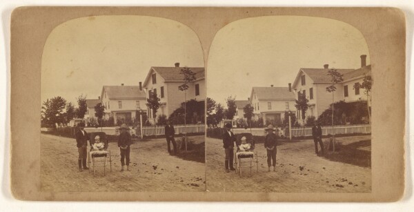 Unknown, [Children posed on street, baby girl in carriage]