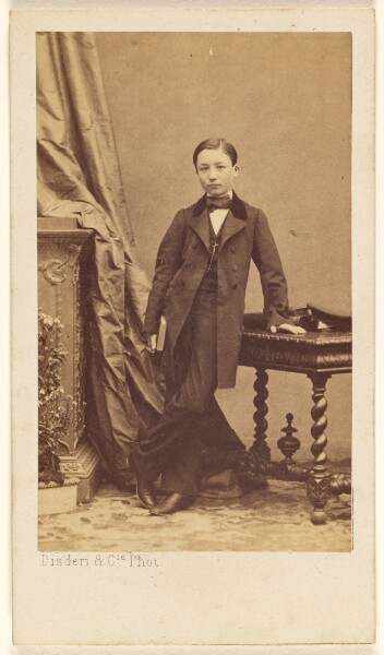 Disdéri & Cie., [Unidentified little boy standing, holding a book]