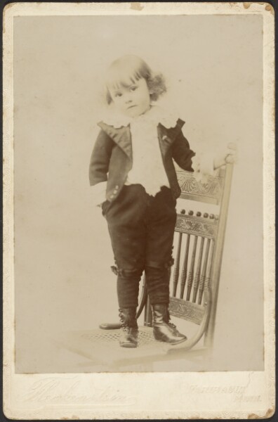 Louis Fleckenstein, [Portrait of Child Standing on Chair]