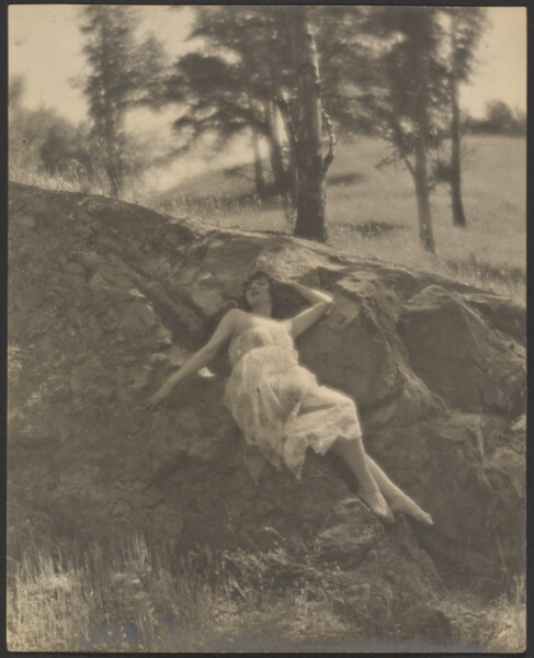 Louis Fleckenstein, [Woman Reclining on Rock Outcrop]