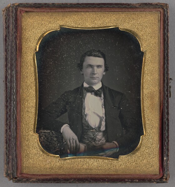 Unknown, [Portrait of a Seated Man Holding a Book]