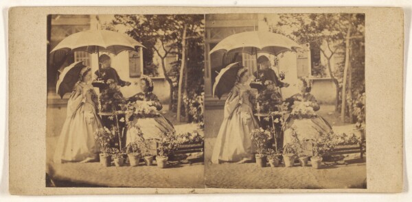 Unknown, [Two ladies, one seated, one standing with a parasol, being served tea at a table under a large umbrella by a man wearing a cap]