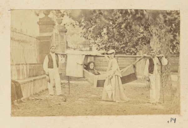 Unknown, [Group portrait with a portable hammock]