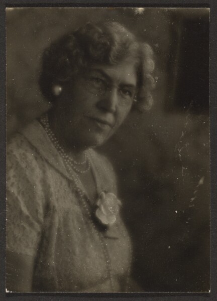 Louis Fleckenstein, [Woman with White Flower and Pearls]