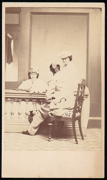 Unknown, [Man, Seen from the Back, Conversing with Two Woman]