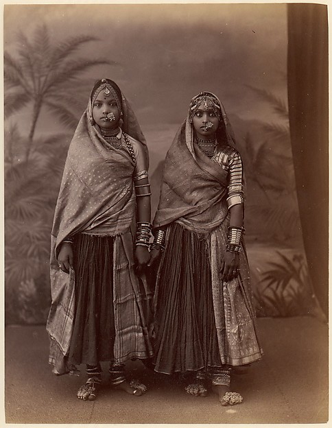 Unknown, [Two Hindu Women in Elaborate Jewelry, Before Studio Backdrop with Palm Trees]
