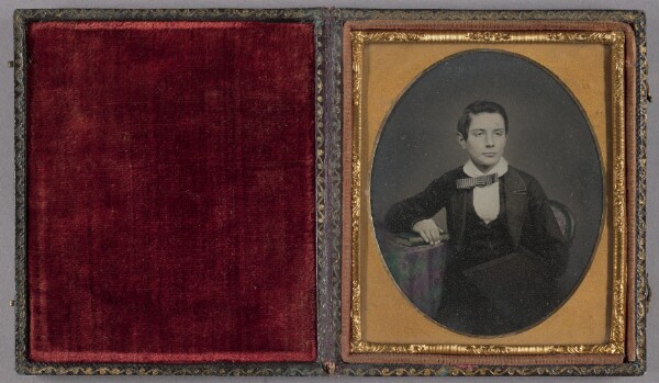Unknown, [Portrait of a Seated Boy in Striped Bow Tie]