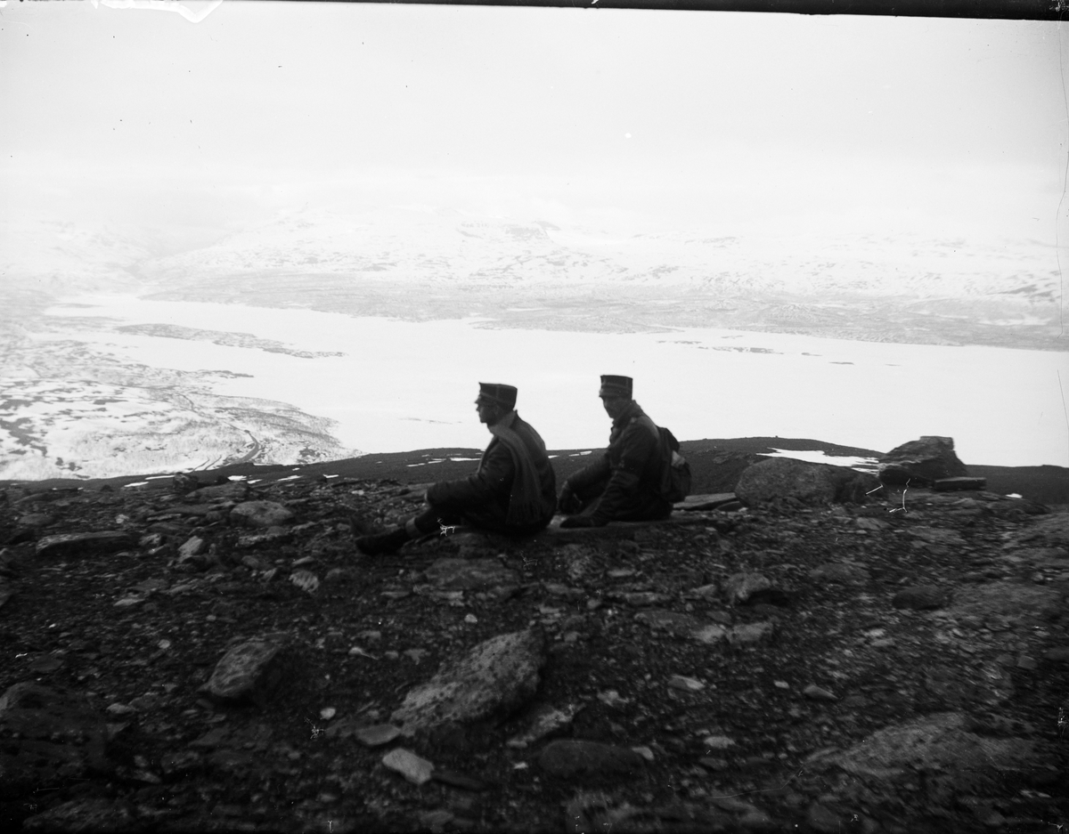 Skötsner-Edhlund, Men in uniform sit and look out over a mountain view, Sweden