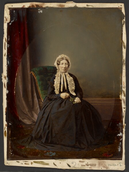 Unknown, [Seated woman in bonnet]