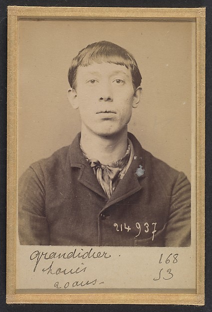 Alphonse Bertillon, Grandidier. Louis, Auguste. 20 ans, né à St-Denis (Seine). Journalier. Anarchiste. 1/3/94.